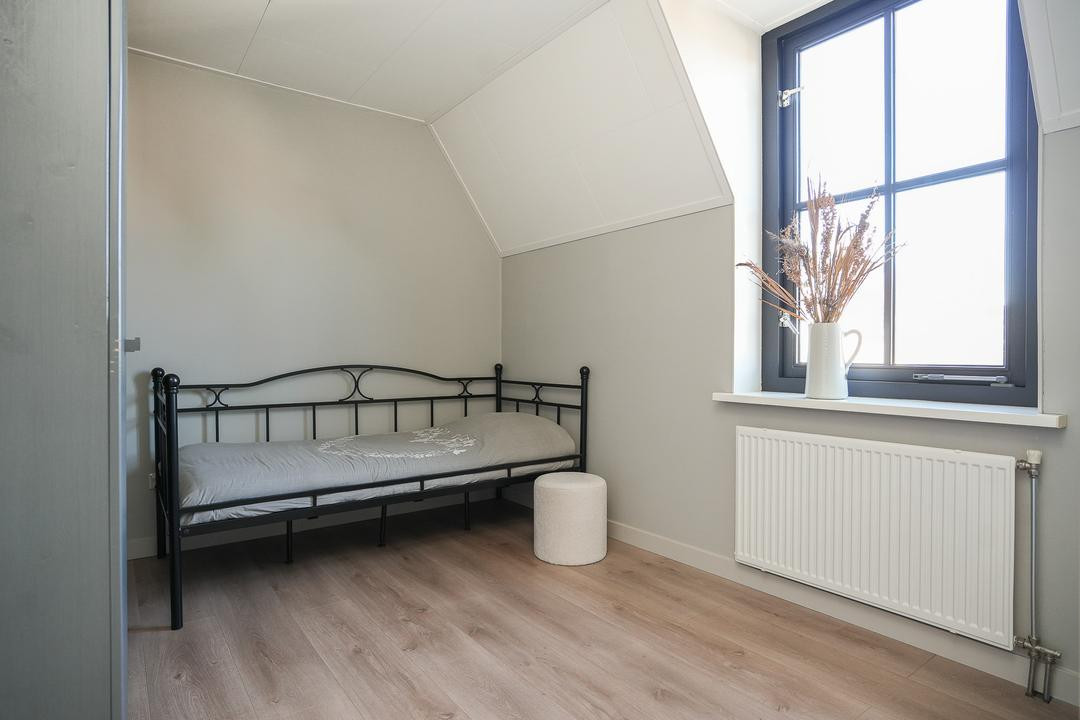 Tussenwoning te koop: Meidoornstraat 20, Opheusden