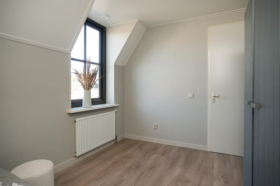 Tussenwoning te koop: Meidoornstraat 20, Opheusden