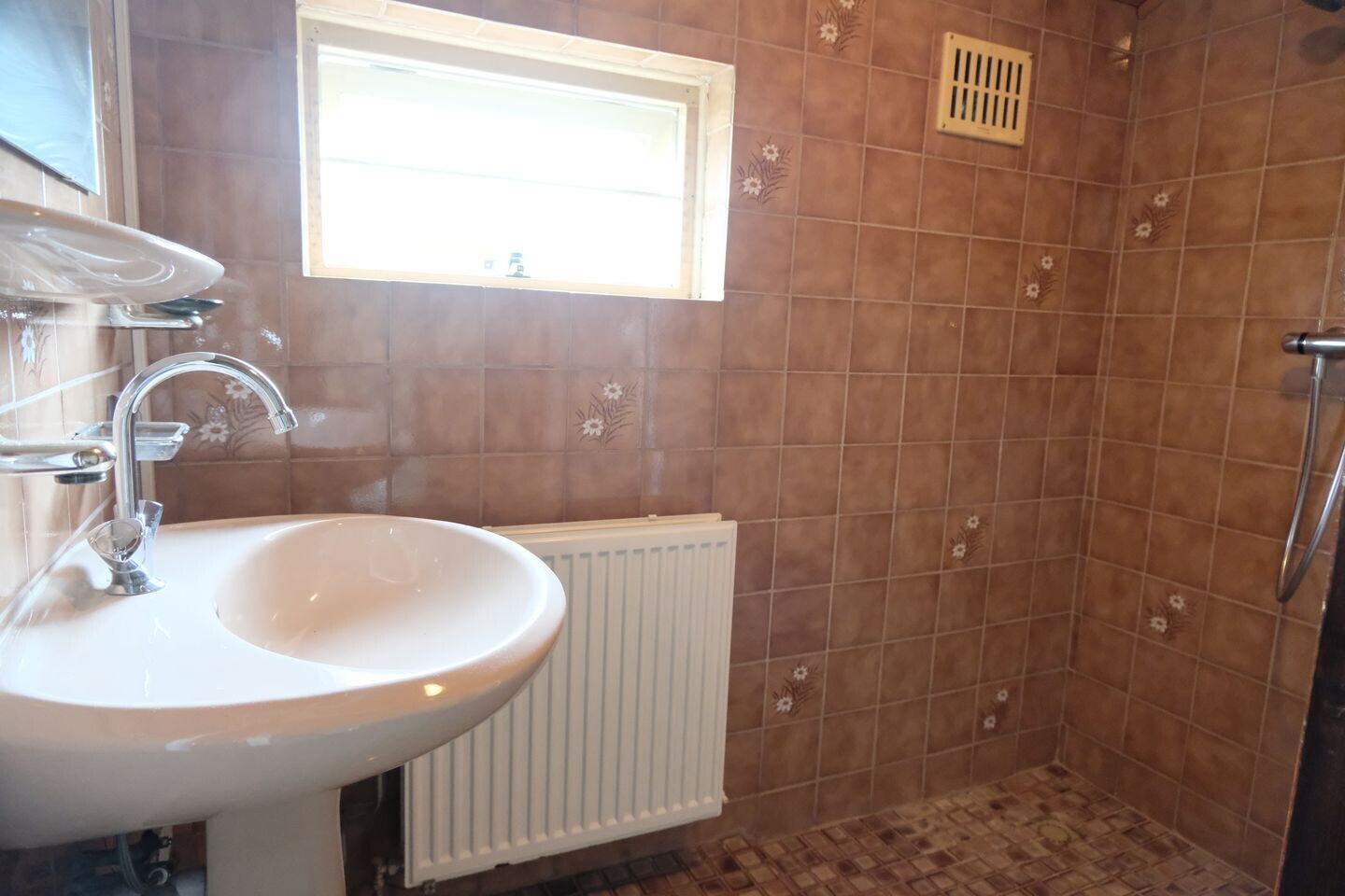 Tussenwoning te koop: Lange Akker 12, Geldermalsen