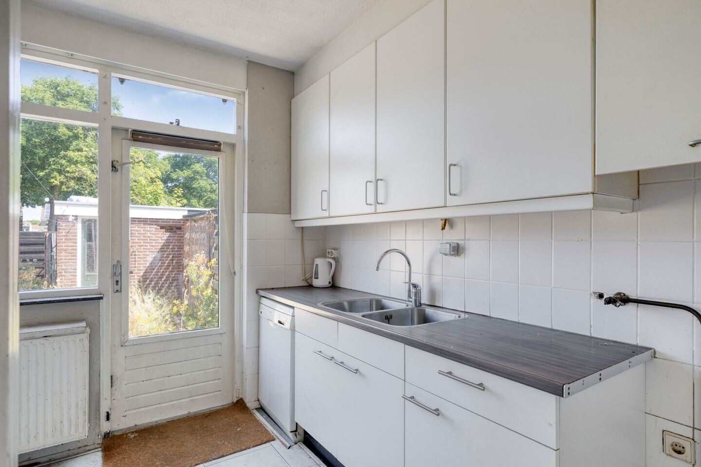 Tussenwoning te koop: Reaganlaan 21, Goes