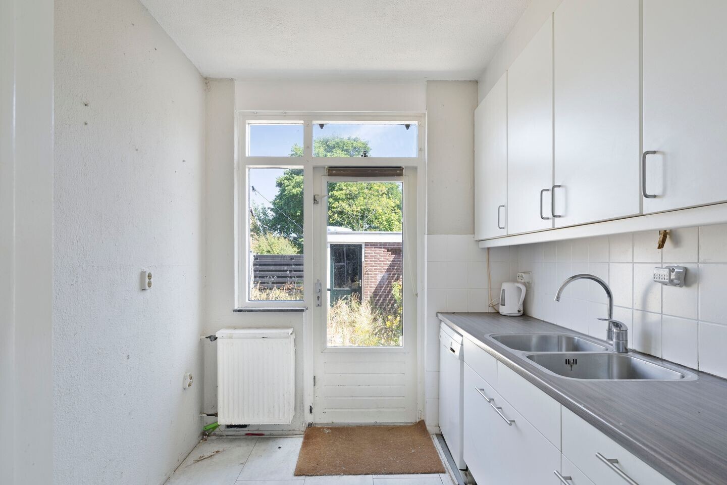 Tussenwoning te koop: Reaganlaan 21, Goes