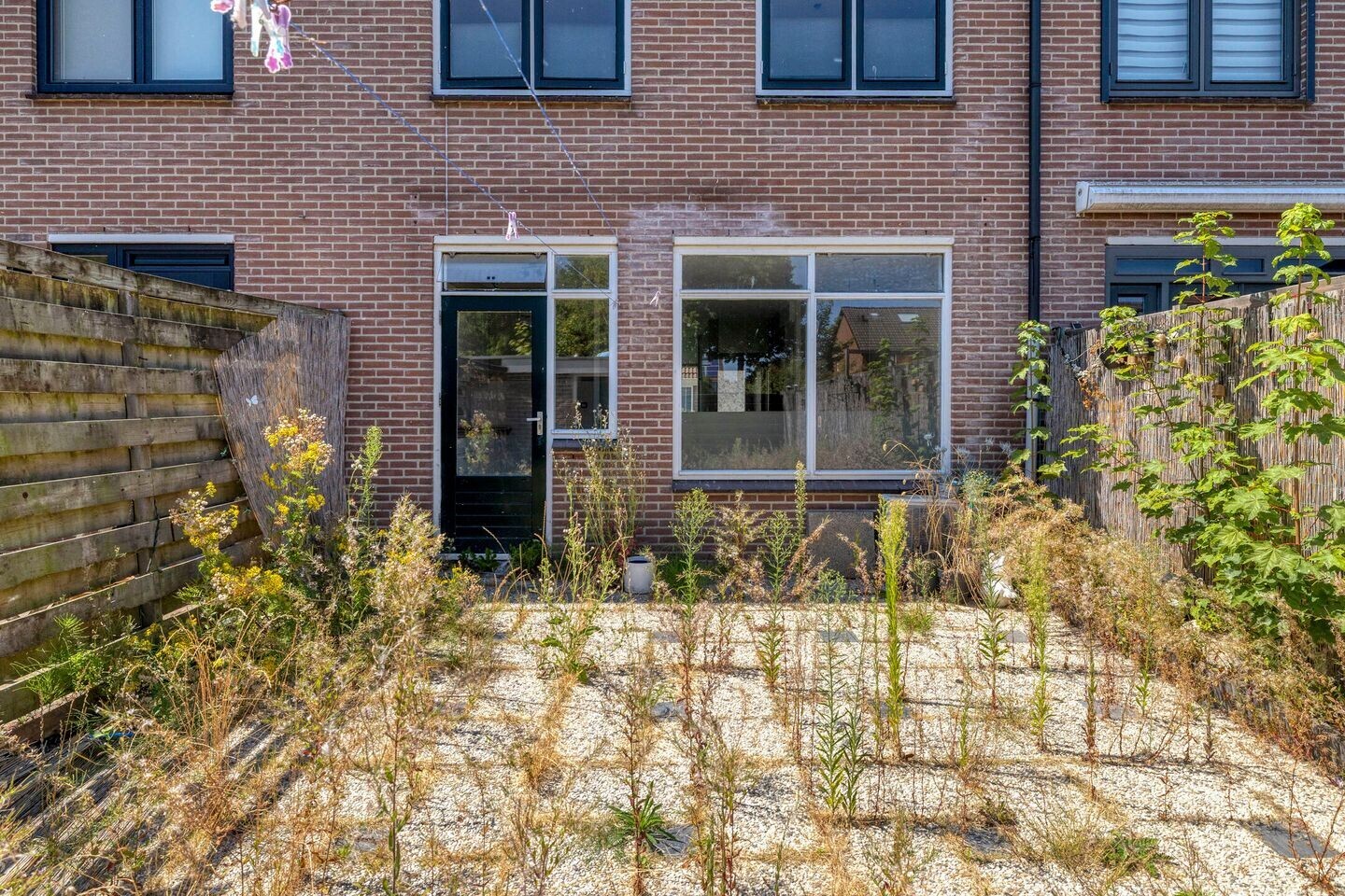 Tussenwoning te koop: Reaganlaan 21, Goes