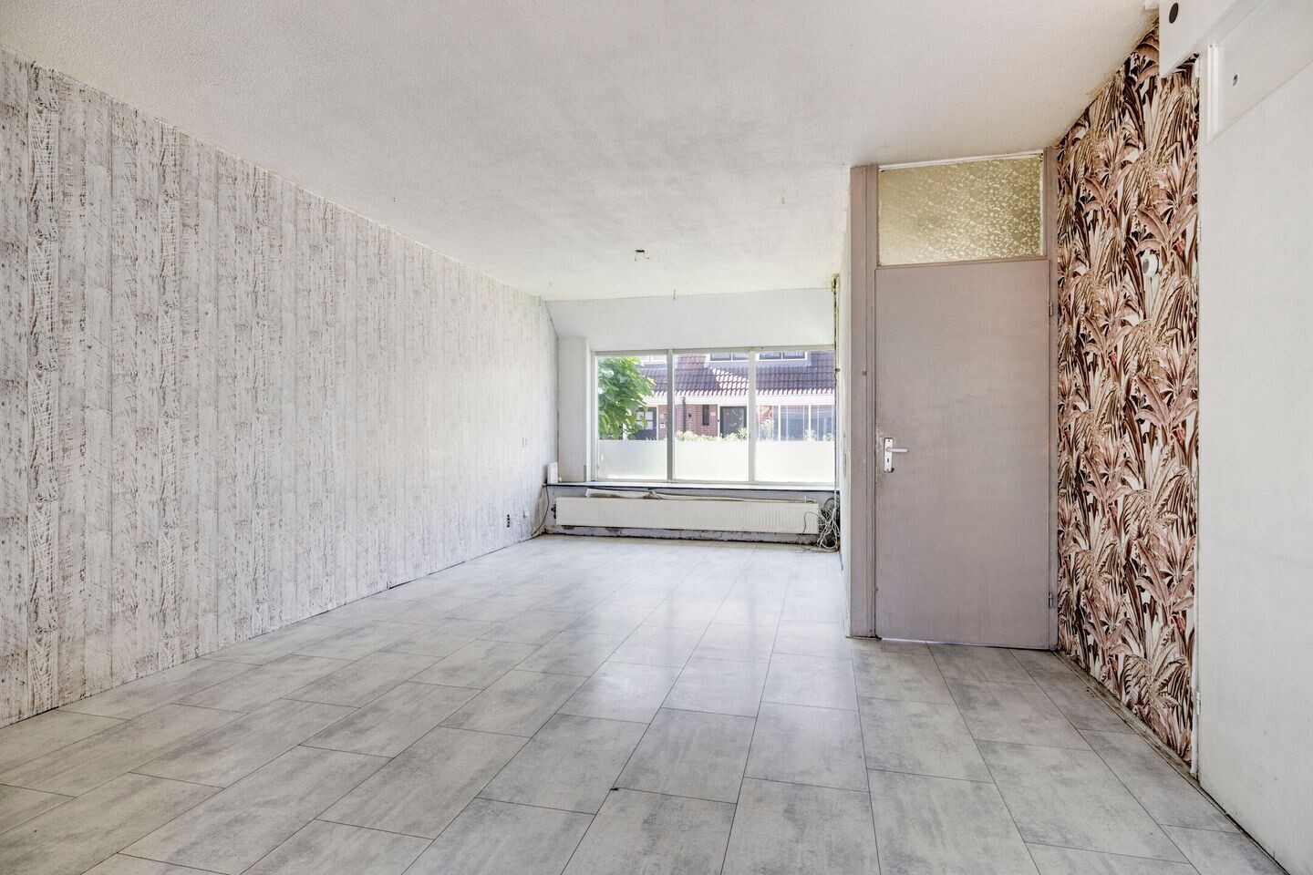 Tussenwoning te koop: Reaganlaan 21, Goes