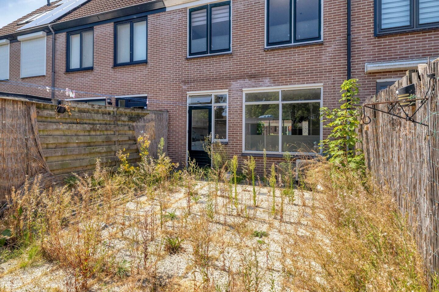 Tussenwoning te koop: Reaganlaan 21, Goes