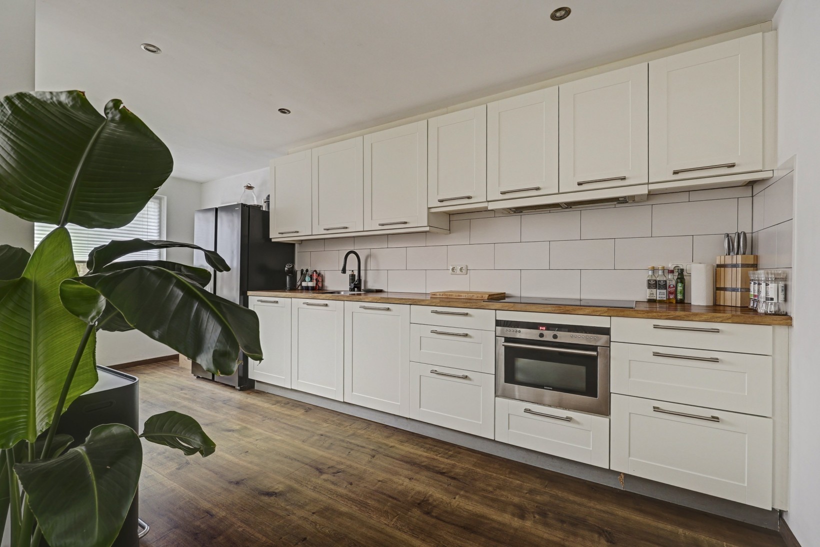 Tussenwoning te koop: Pieter van Botlantlaan 28, Nieuw-Vossemeer