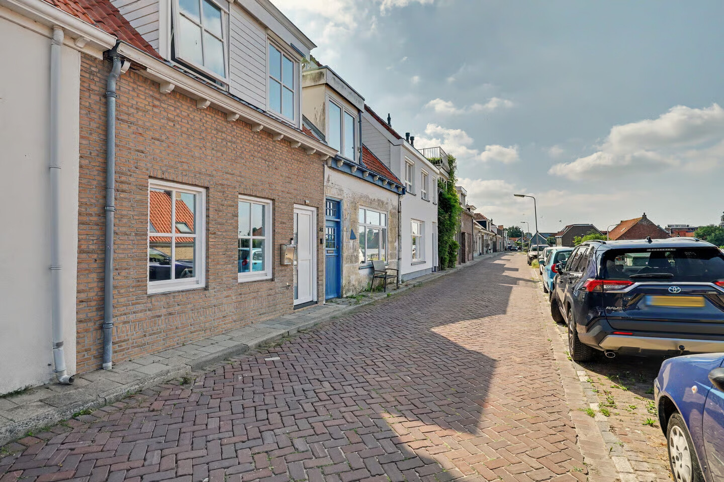 Tussenwoning te koop: Molendijk 52, Stavenisse