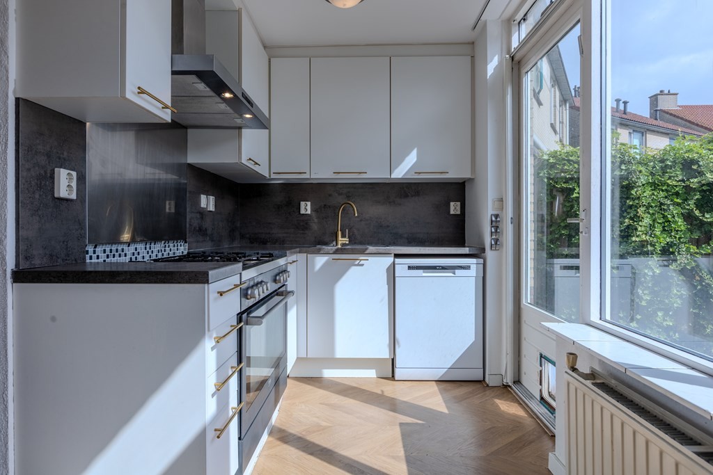 Tussenwoning te koop: Carel Willinkplein 13, Roosendaal