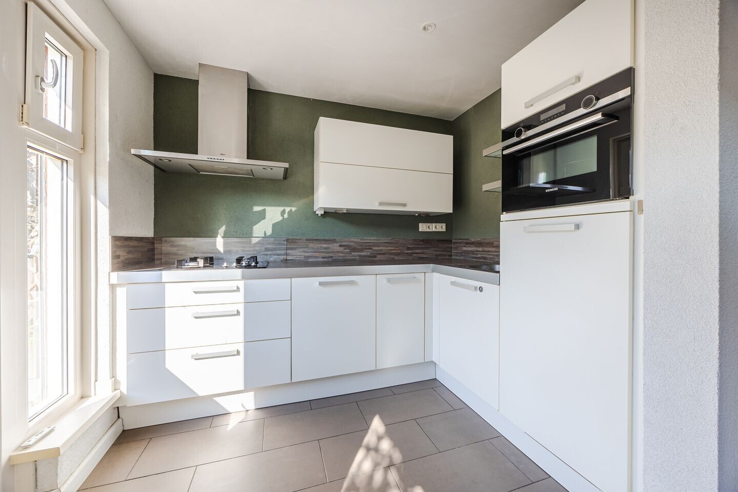Tussenwoning te koop: Doctor Ariënslaan 155, Zevenbergen