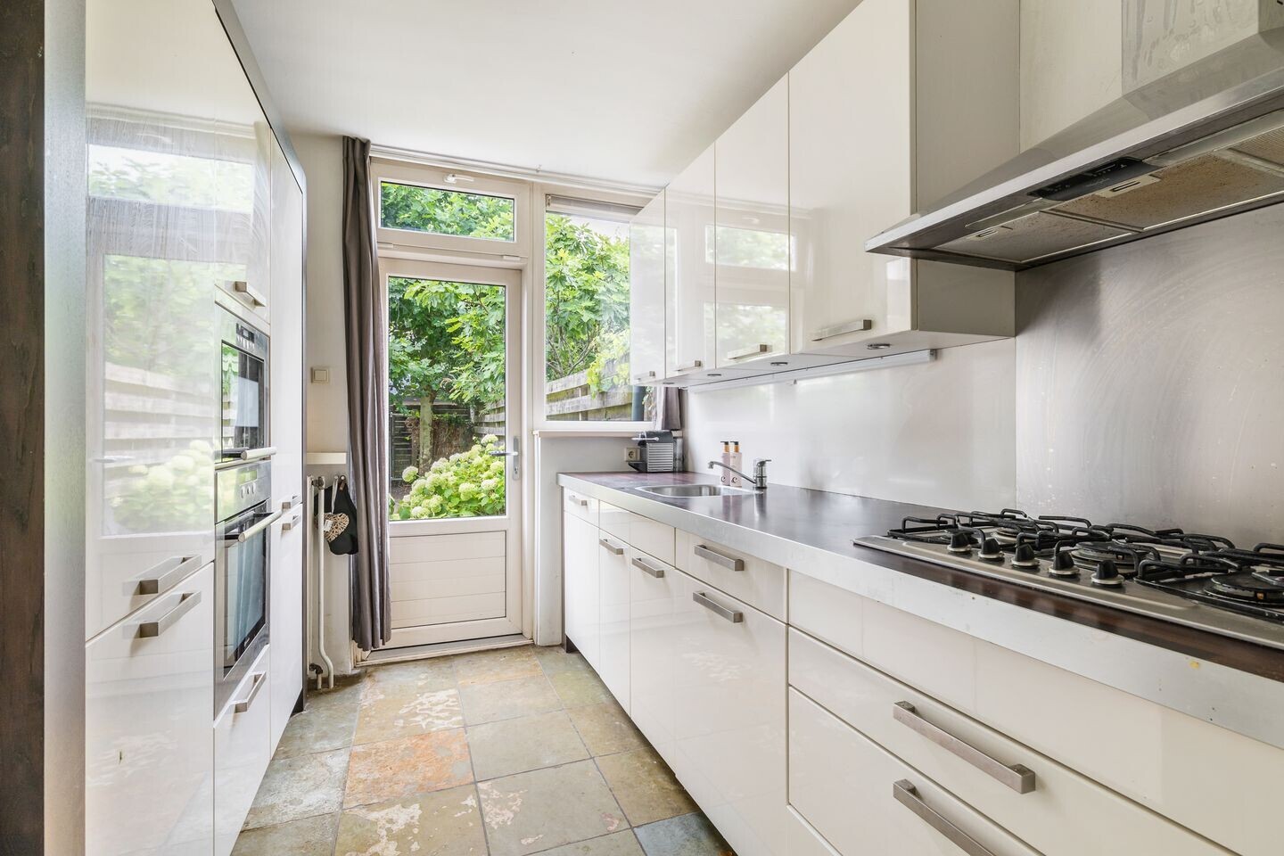 Tussenwoning te koop: Hillenraadstraat 44, Breda