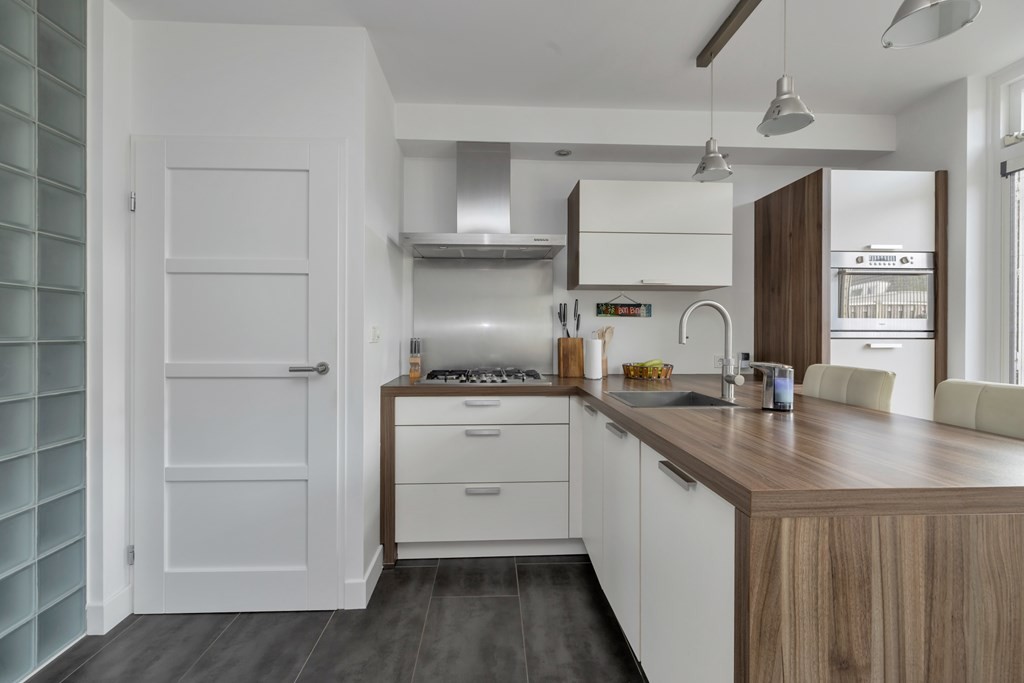 Tussenwoning te koop: Roerdomp 50, Etten-Leur