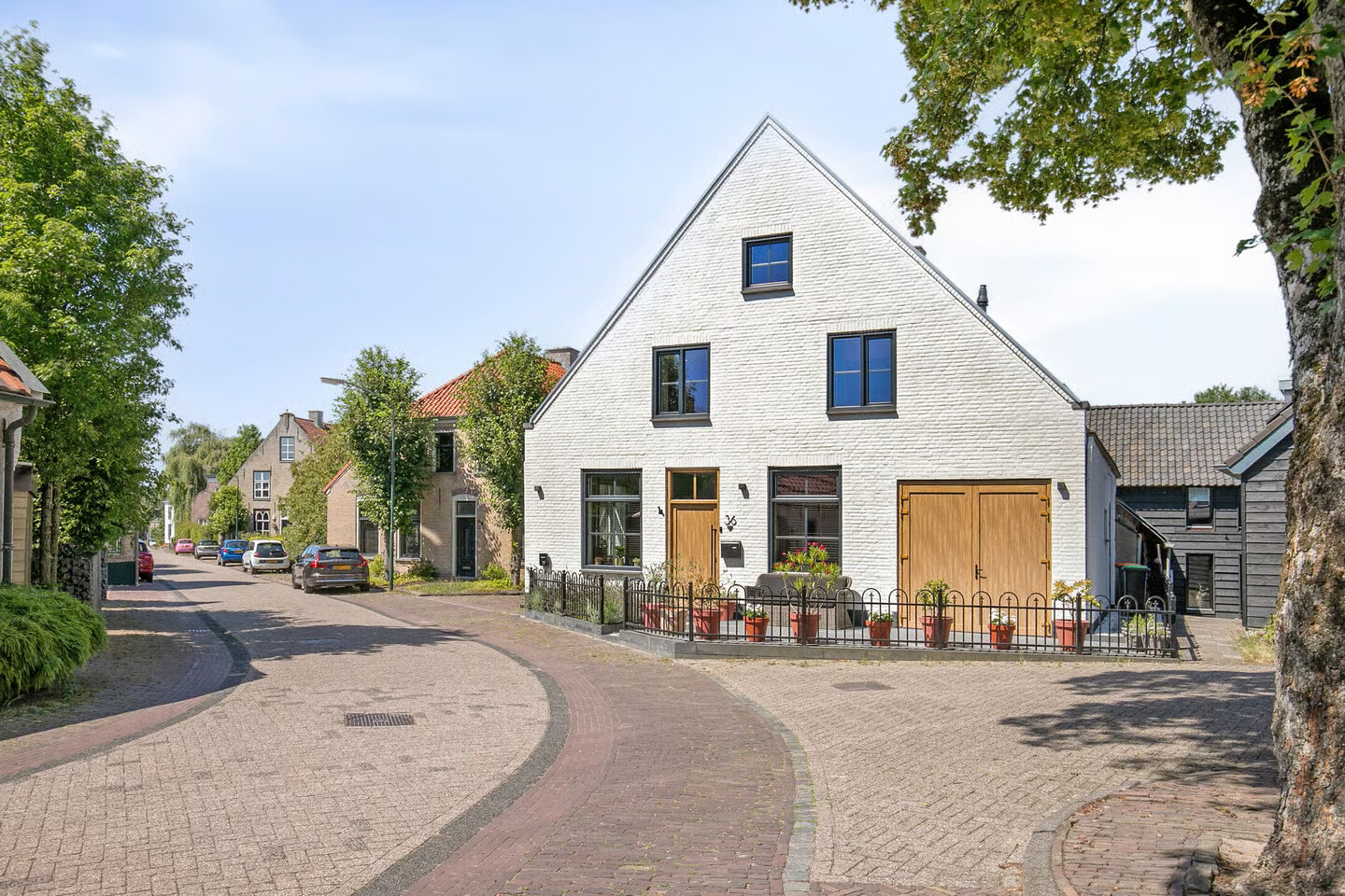 Twee-onder-één-kap te koop: Molenstraat 36, Raamsdonk