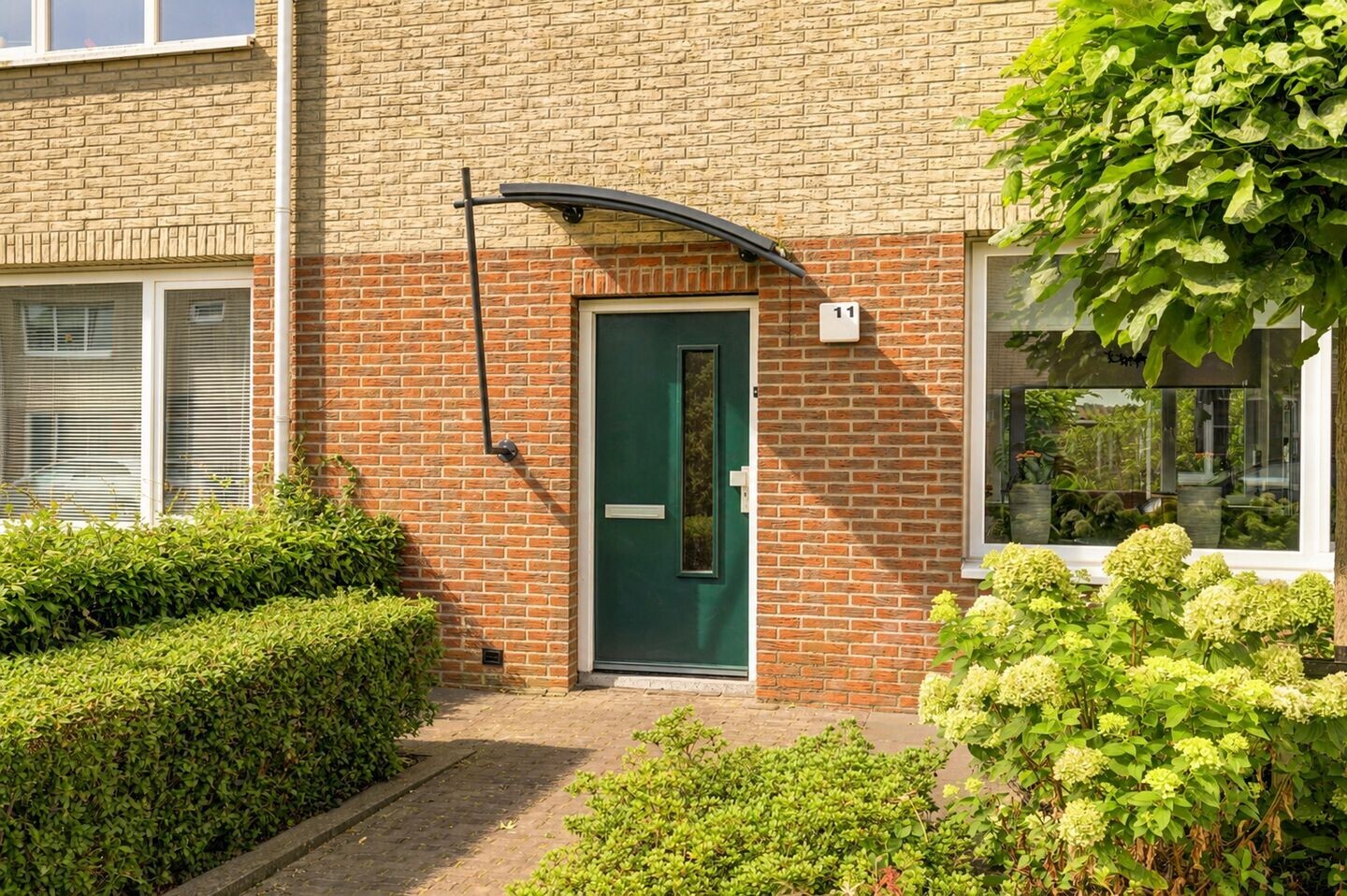 Tussenwoning te koop: Cornelis Oomestraat 11, Raamsdonk