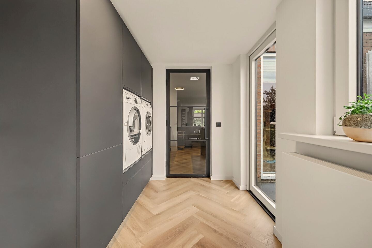 Tussenwoning te koop: Kuiperspolderke 55, Raamsdonk