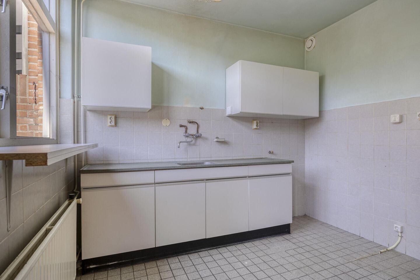 Tussenwoning te koop: Ruynemanstraat 64, Tilburg