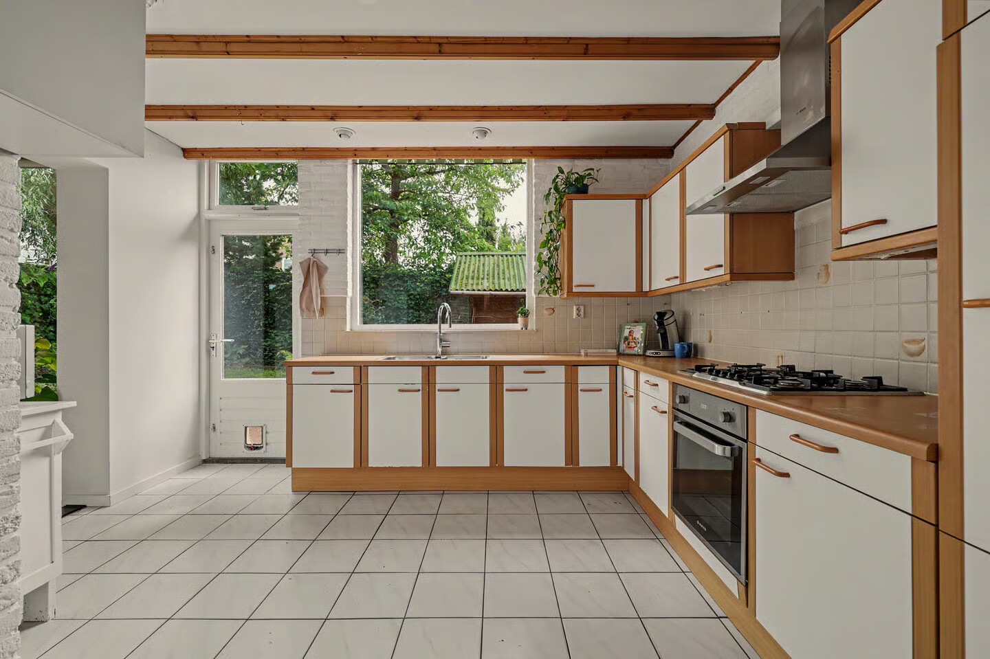 Tussenwoning te koop: Strausslaan 38, Vlijmen