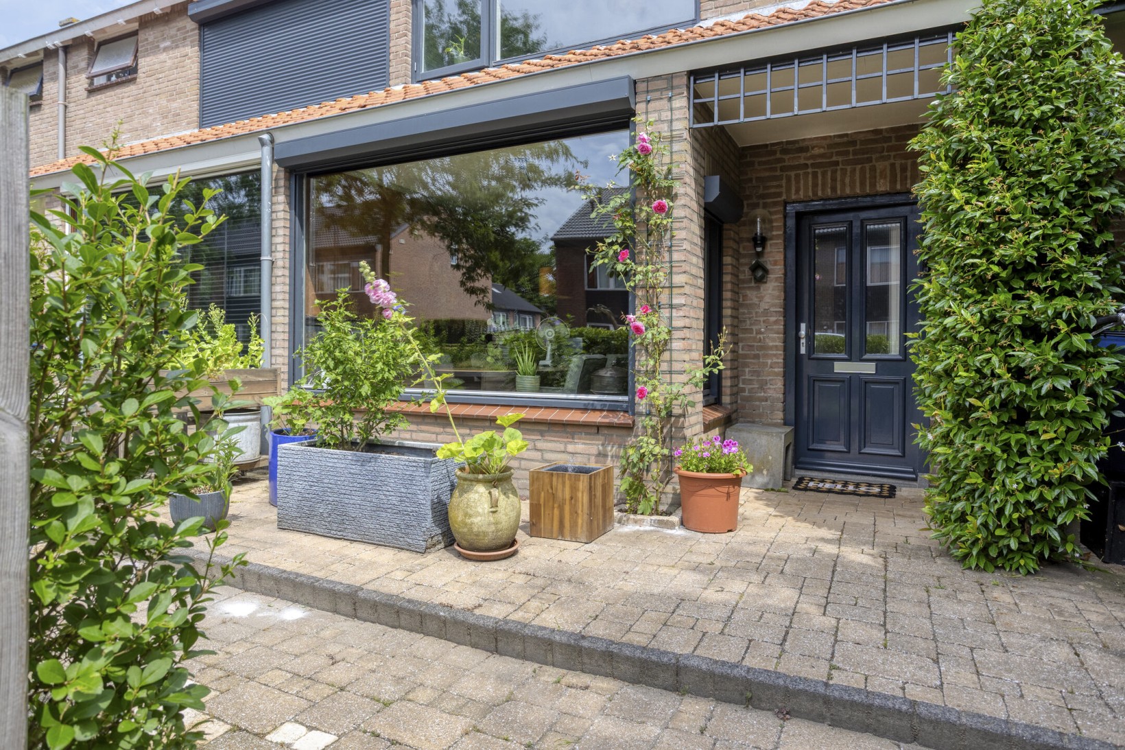 Tussenwoning te koop: Molenhei 18, Vught