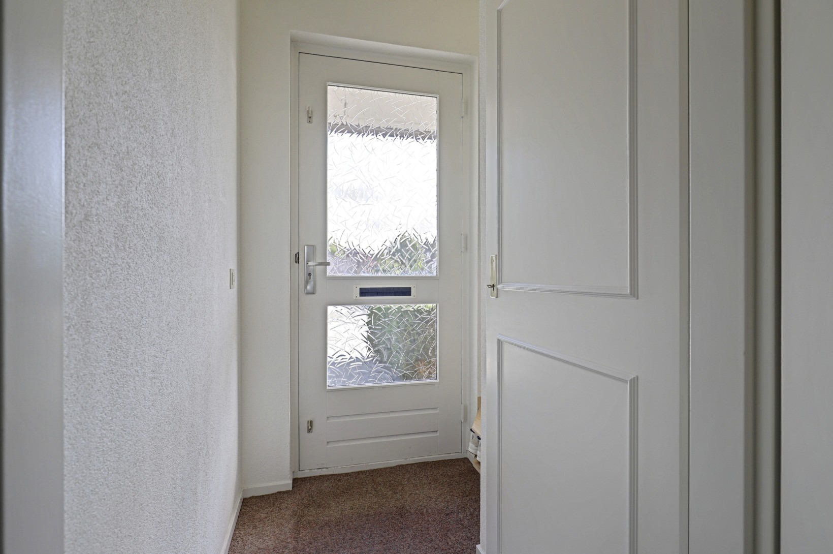 Tussenwoning te koop: De Torenvalk 21, Rossum