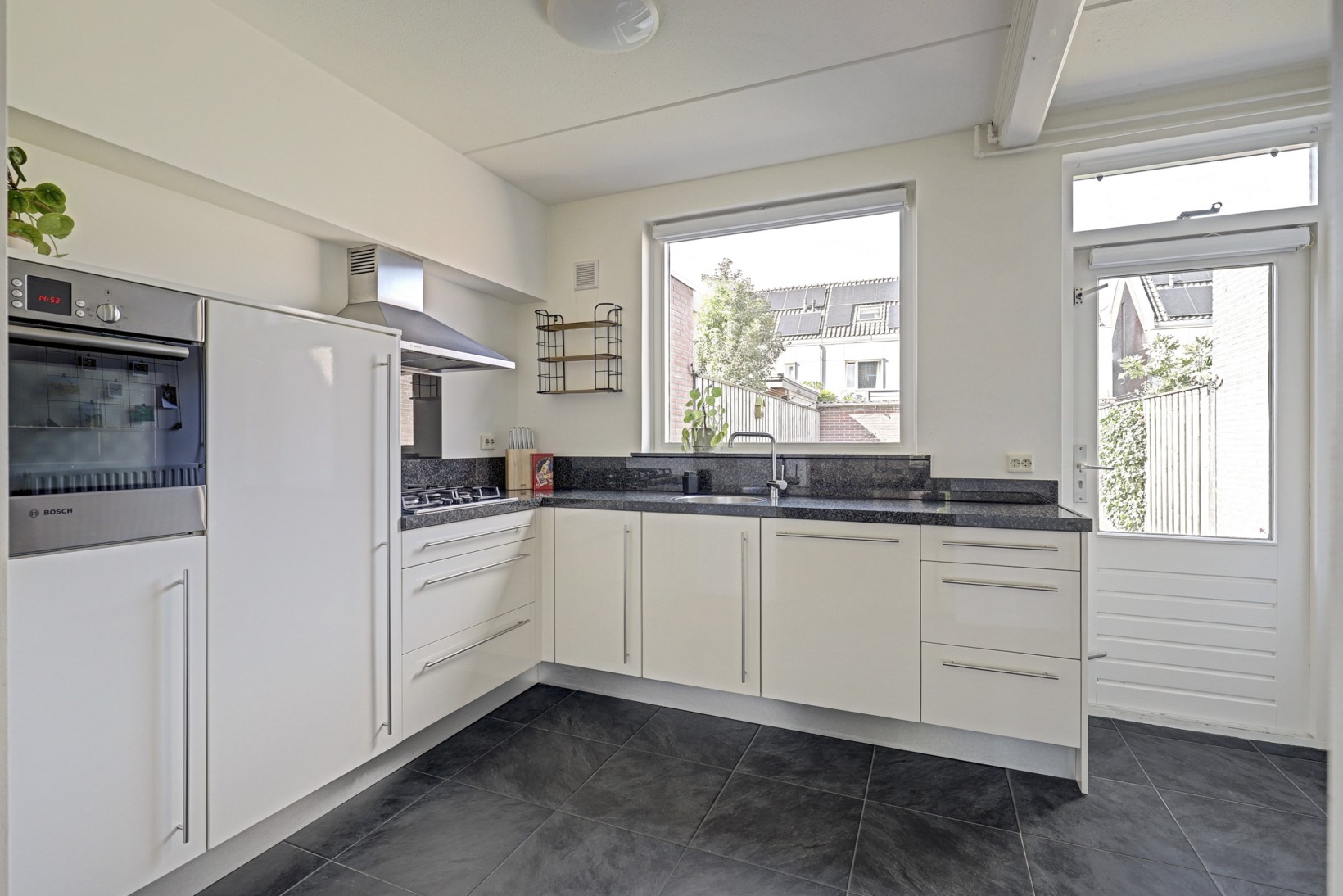 Tussenwoning te koop: De Torenvalk 21, Rossum