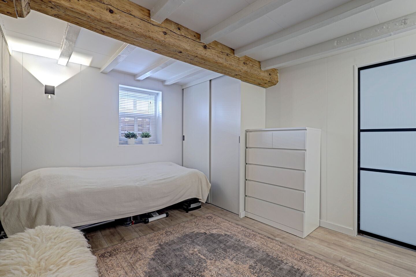 Tussenwoning te koop: Rogstraat 28, Grave