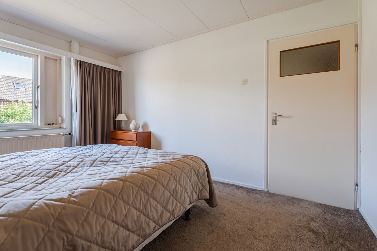 Tussenwoning te koop: de Quaylaan 74, Grave