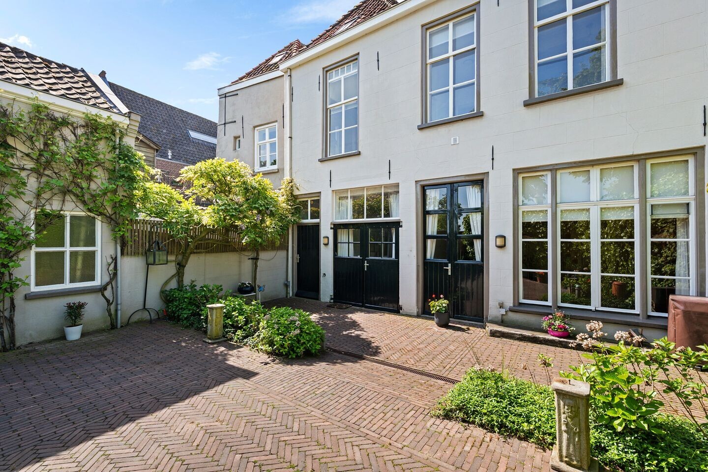 Tussenwoning te koop: Kolonel Wilsstraat 1, Ravenstein