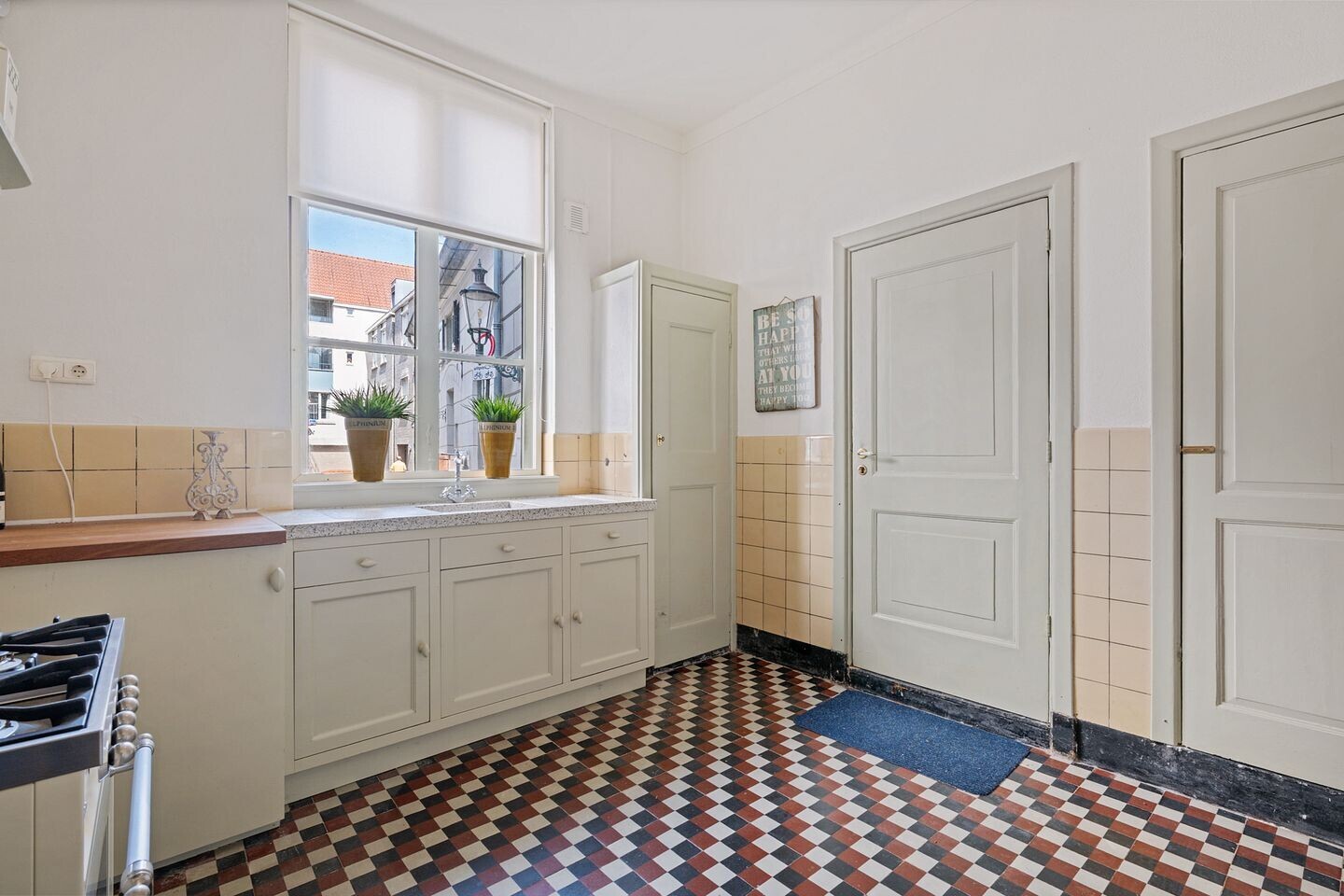 Tussenwoning te koop: Kolonel Wilsstraat 1, Ravenstein