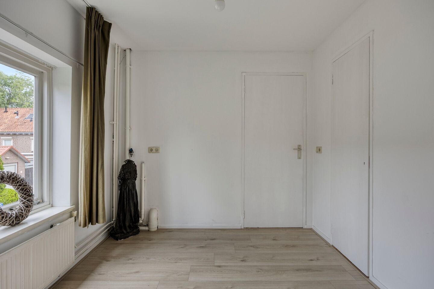 Tussenwoning te koop: Reinoldstraat 28, Uden