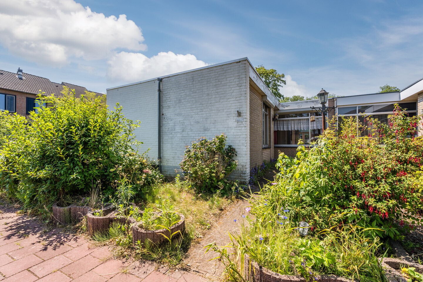 Tussenwoning te koop: Korhoenderveld 207, Cuijk
