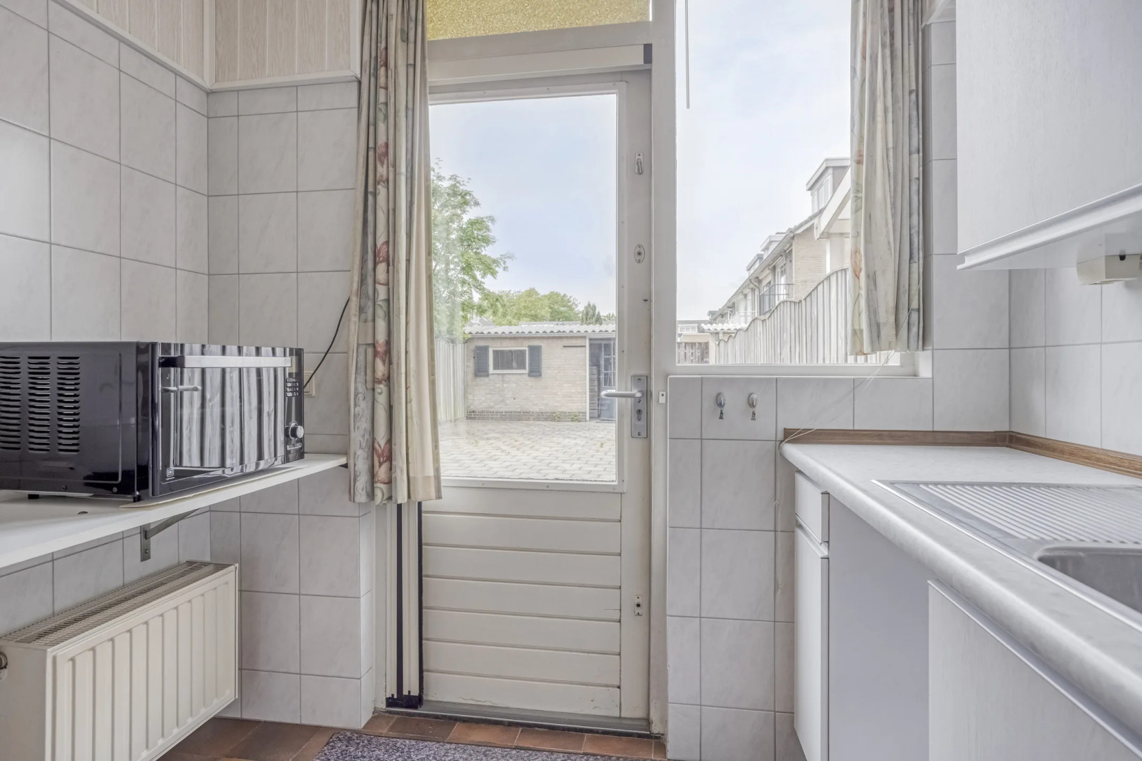 Tussenwoning te koop: Noordzeelaan 27, Eindhoven