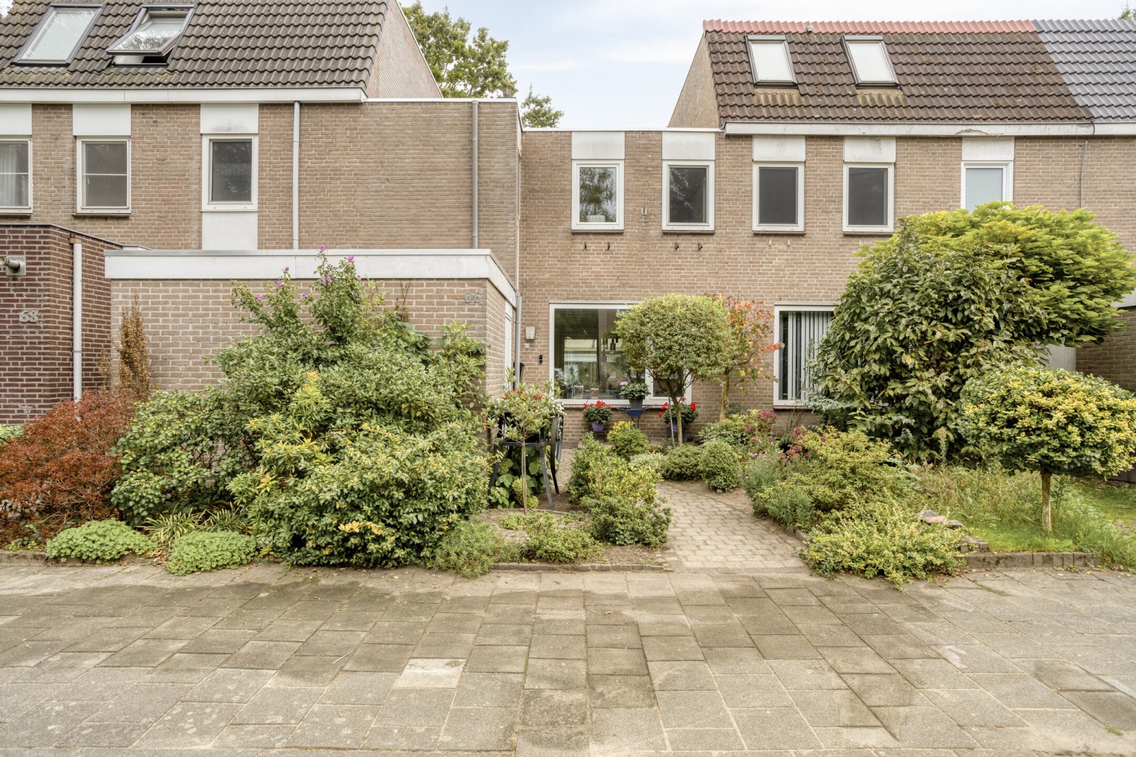 Tussenwoning te koop: Johan Frisopark 66, Best