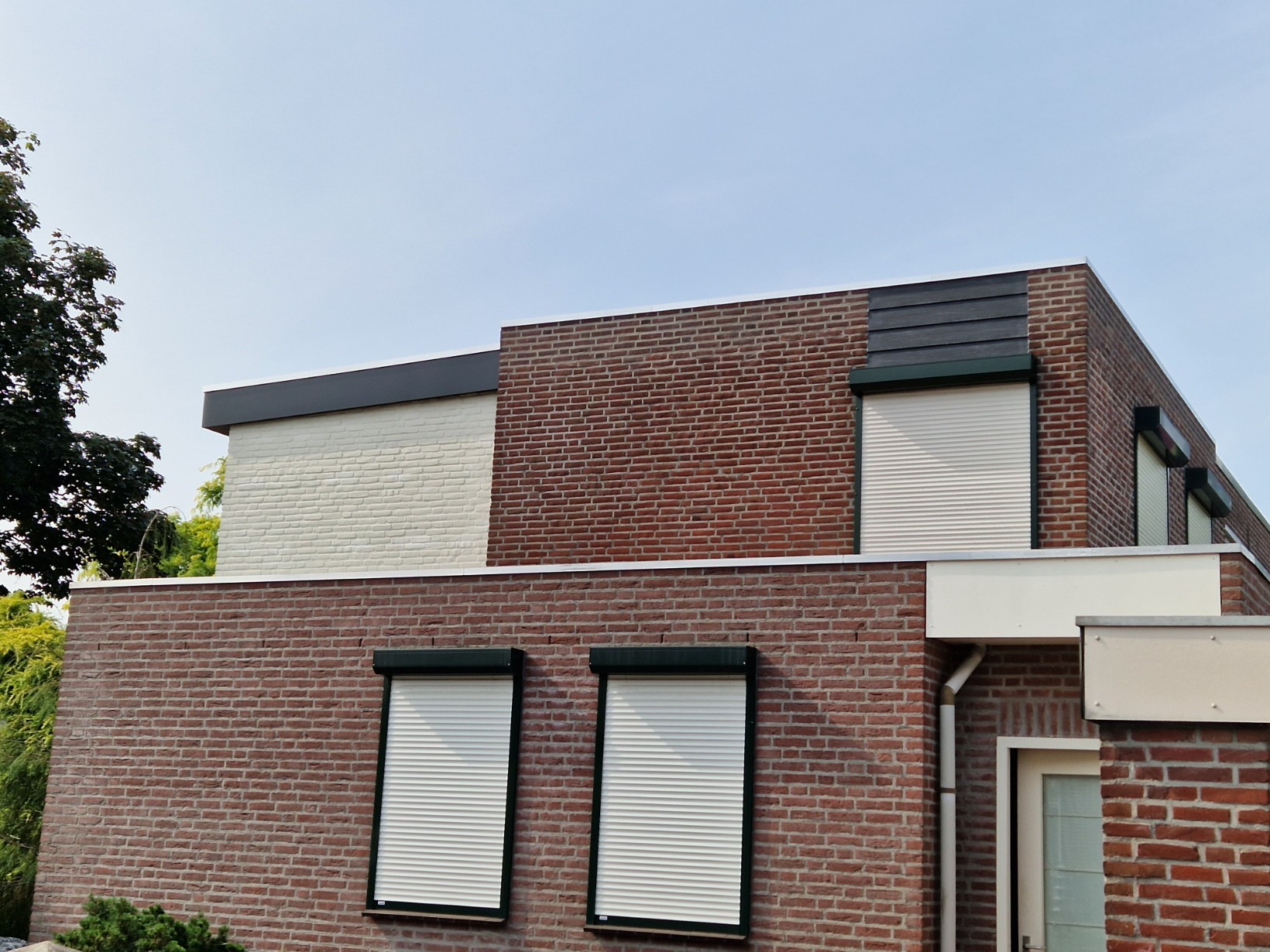 Tussenwoning te koop: Graafschap Kesselstraat 52, Panningen