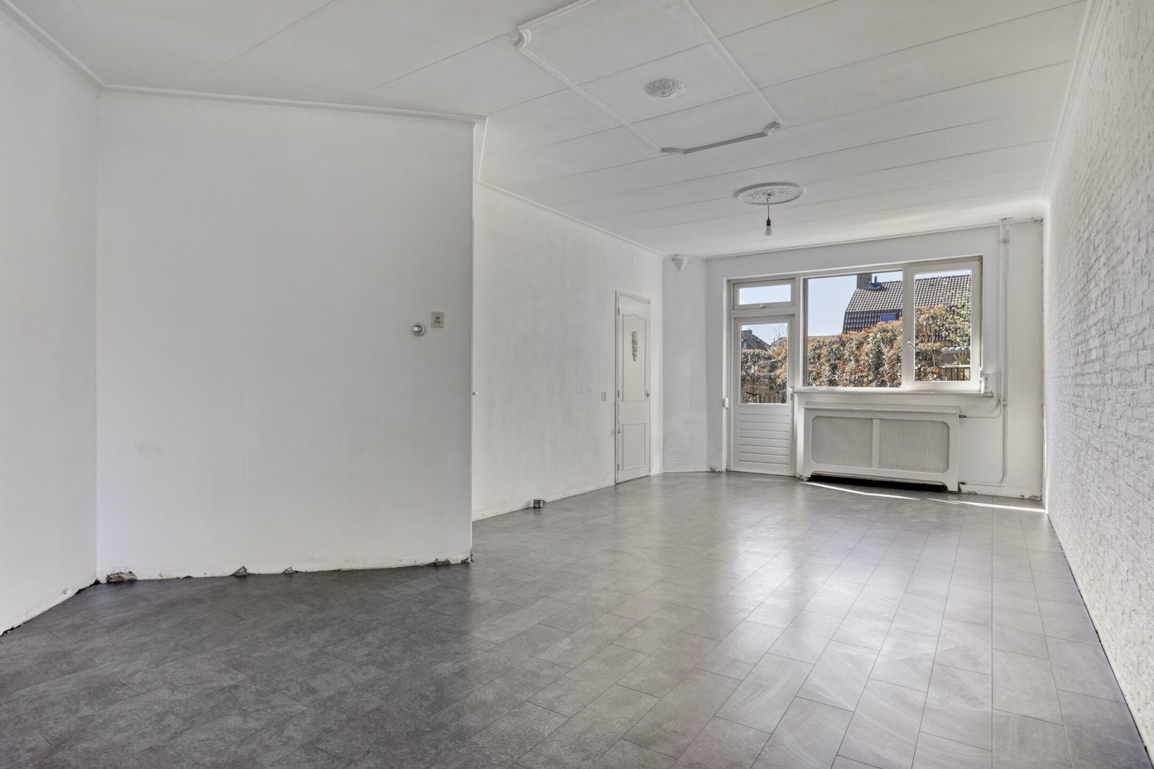 Tussenwoning te koop: Koningin Regentesselaan 82, Roermond