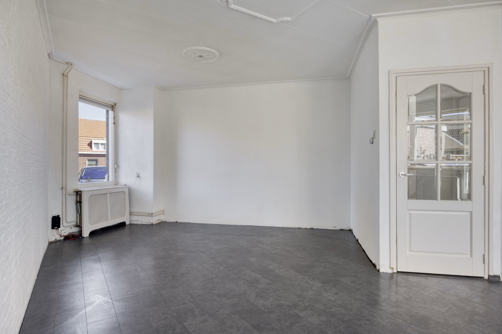 Tussenwoning te koop: Koningin Regentesselaan 82, Roermond