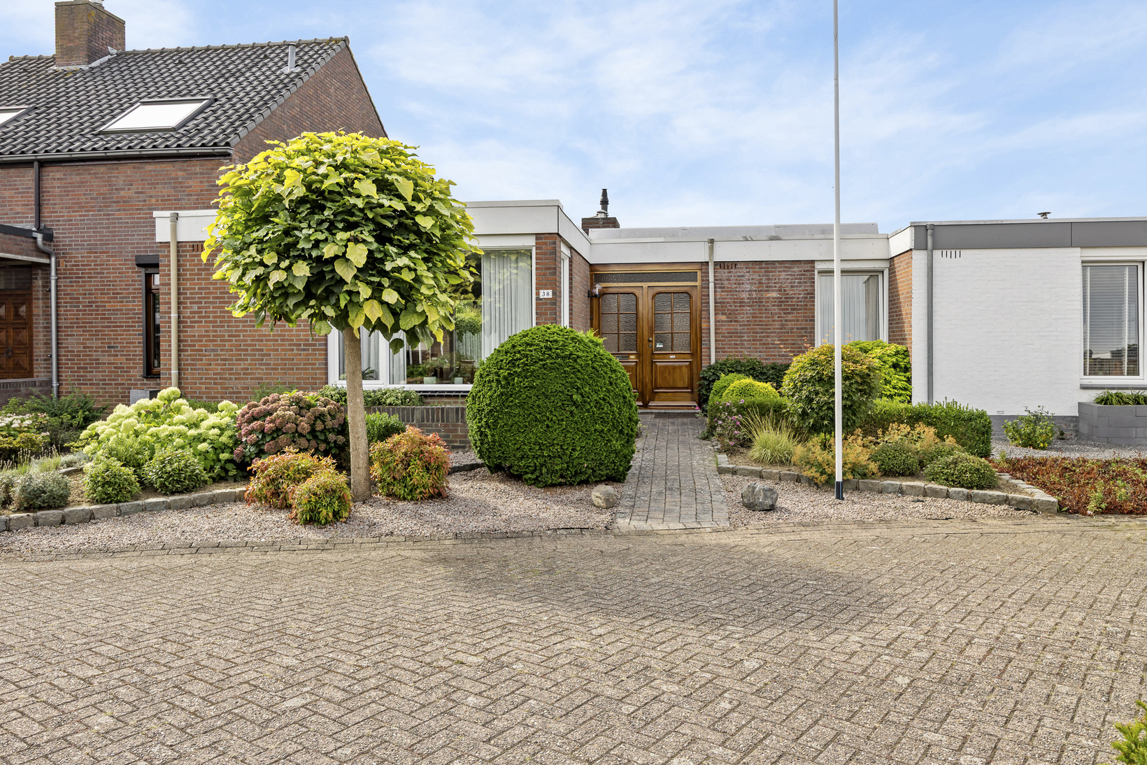 Tussenwoning te koop: Hagenaarpark 38, Maasbracht
