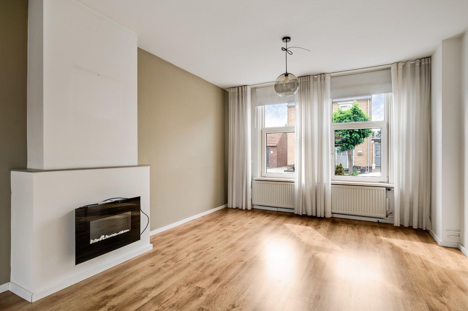 Tussenwoning te koop: Raadhuisstraat 30, Maasbracht