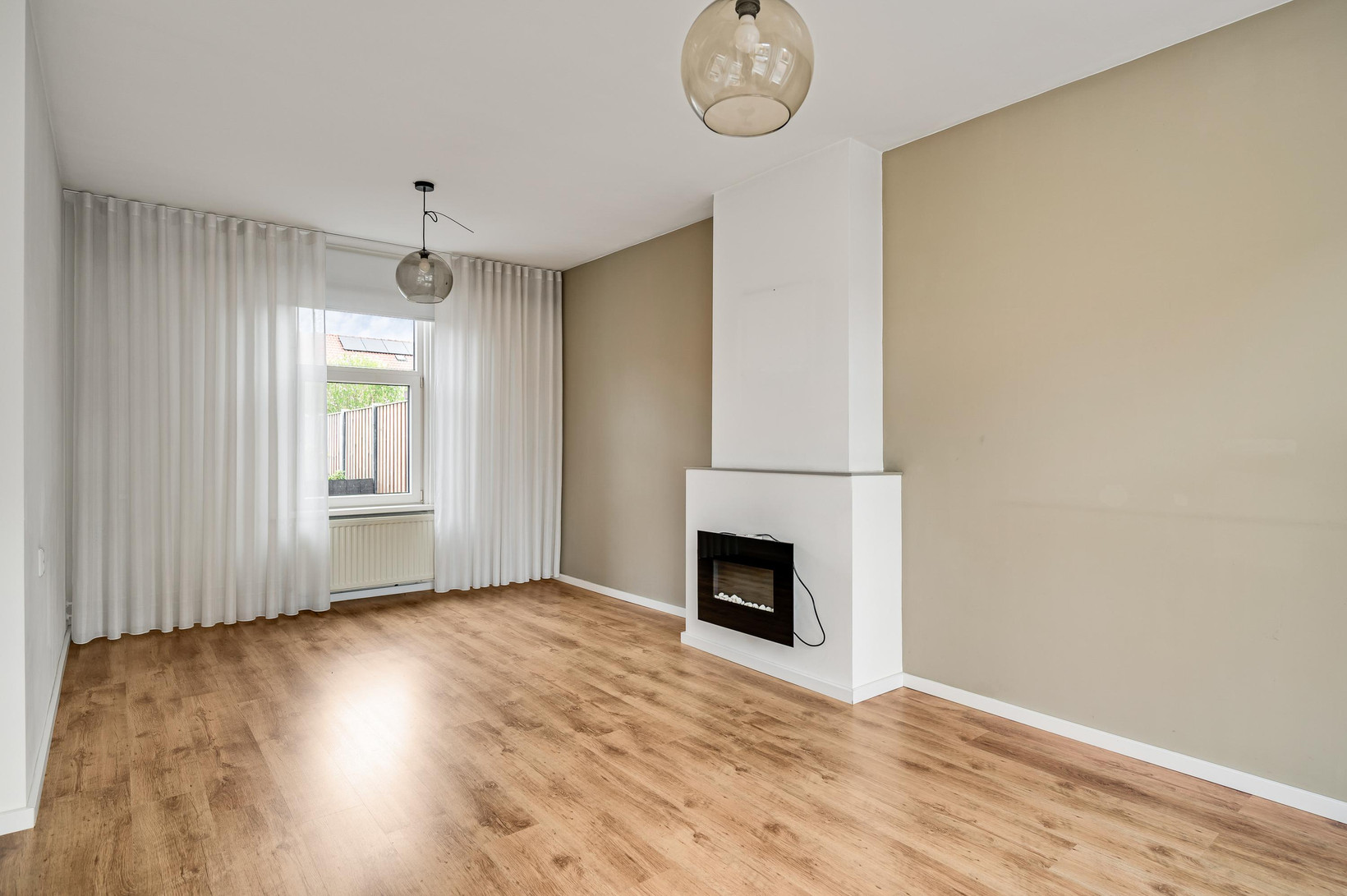 Tussenwoning te koop: Raadhuisstraat 30, Maasbracht