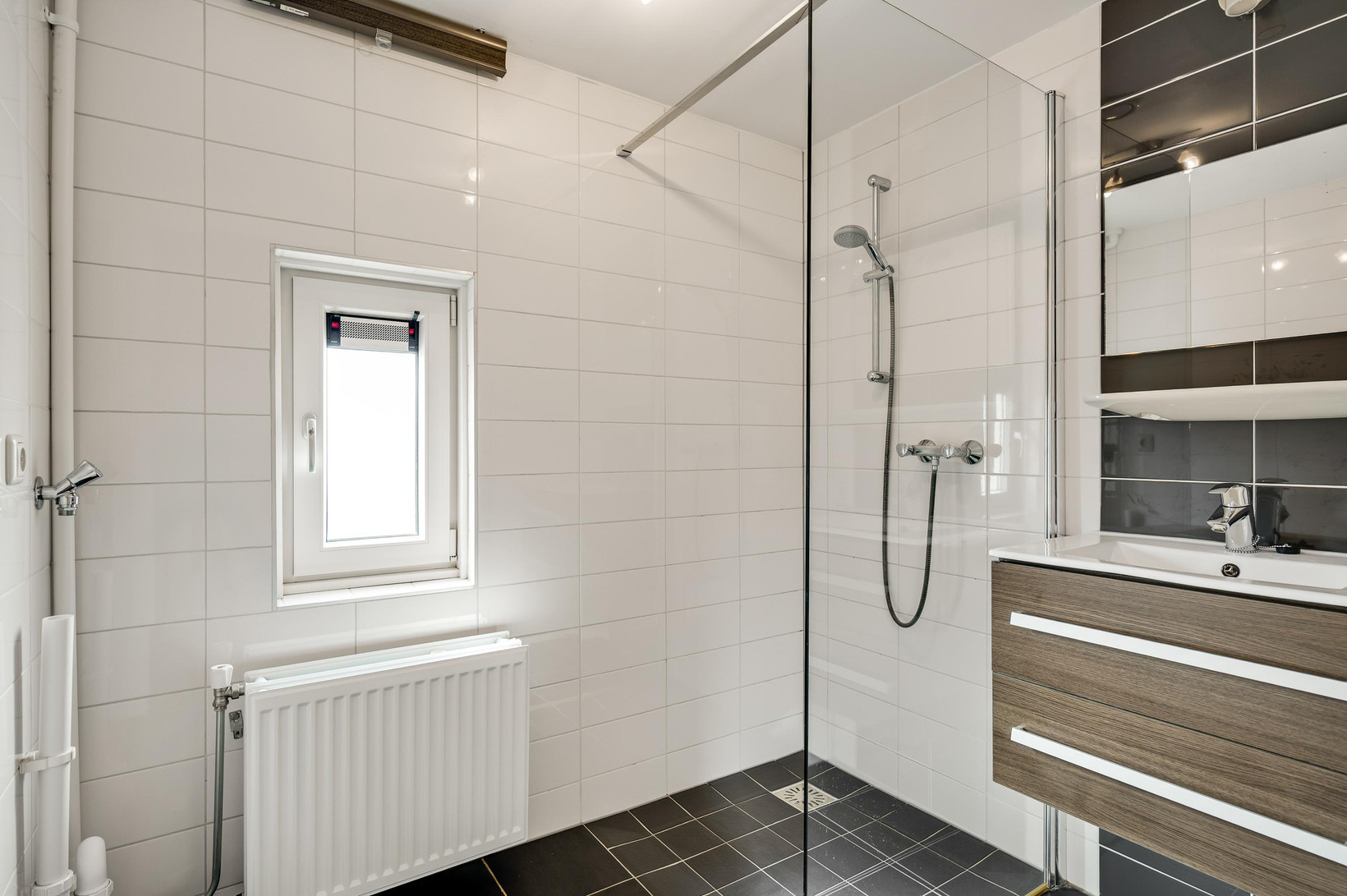 Tussenwoning te koop: Raadhuisstraat 30, Maasbracht