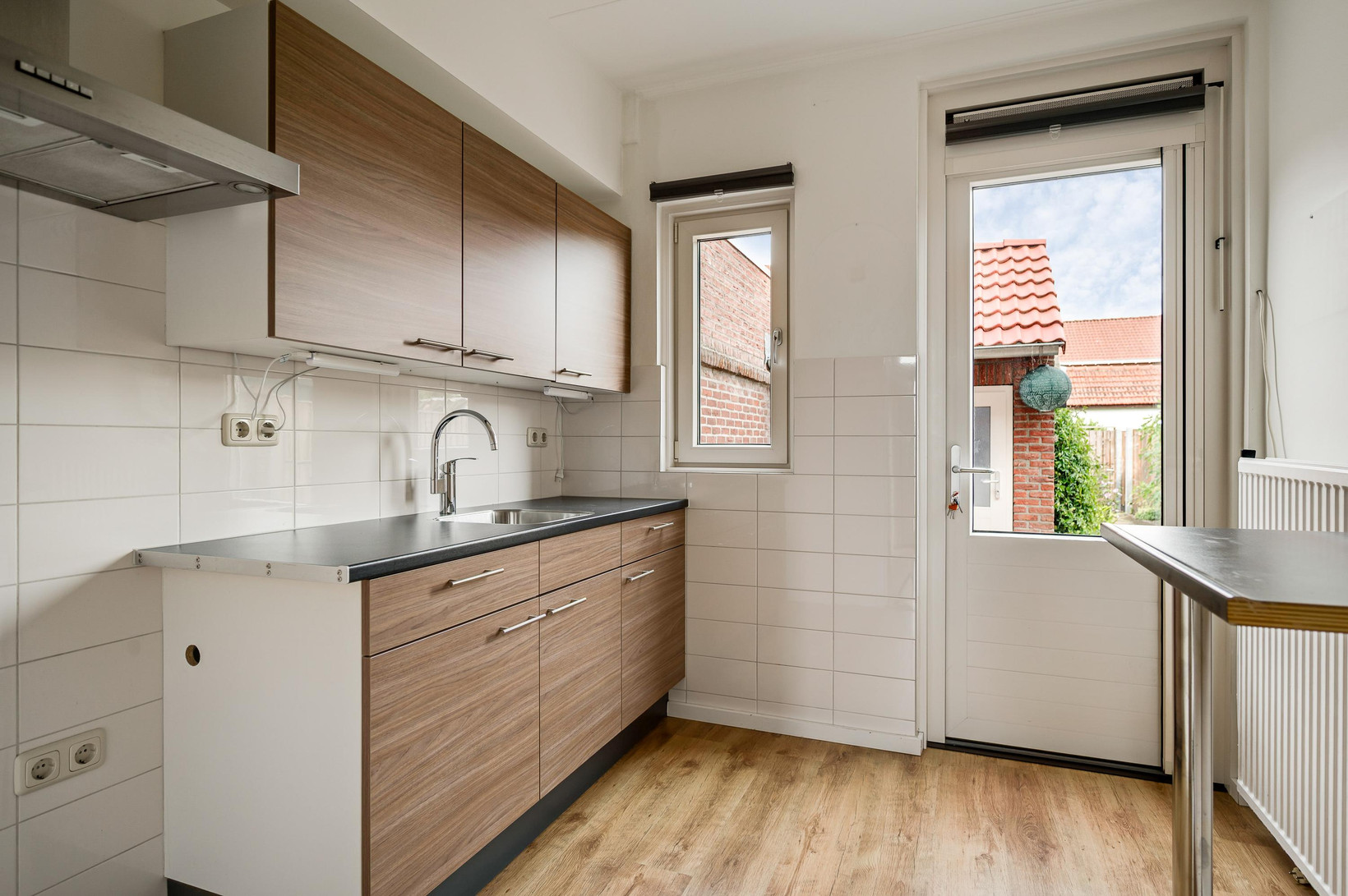 Tussenwoning te koop: Raadhuisstraat 30, Maasbracht