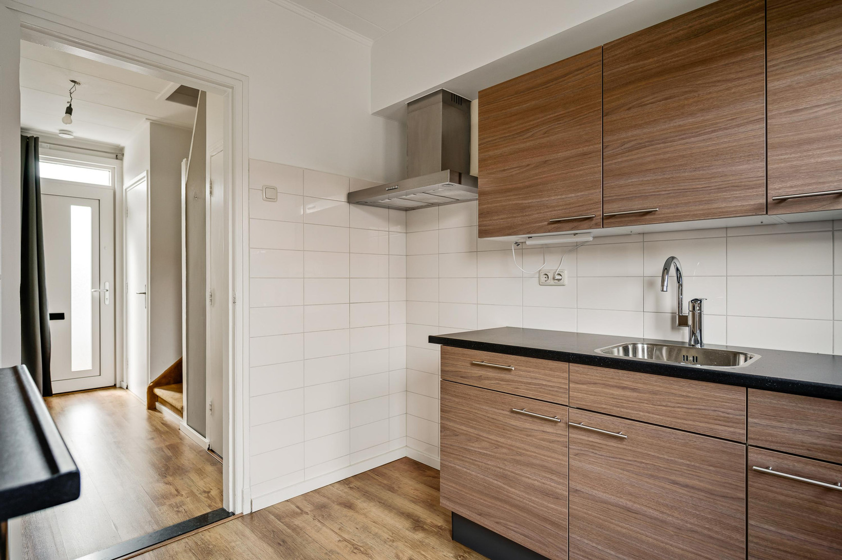 Tussenwoning te koop: Raadhuisstraat 30, Maasbracht