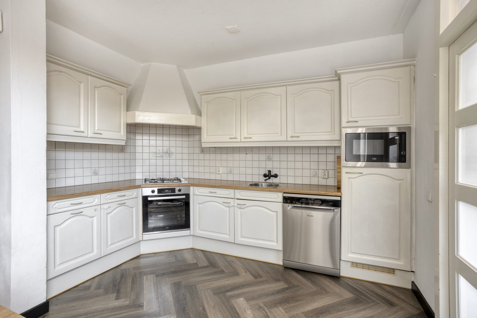Tussenwoning te koop: Vinkenstraat 34, Heythuysen