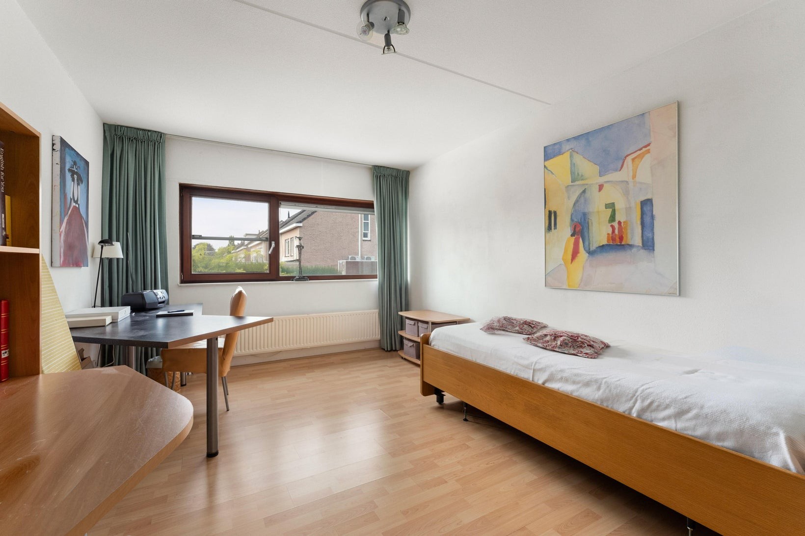 Tussenwoning te koop: Aronskelk 77, Elsloo