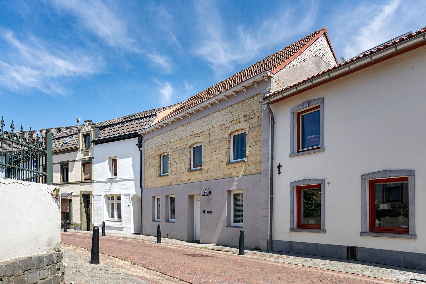 Tussenwoning te koop: Mgr. Brulsstraat 11, Hulsberg