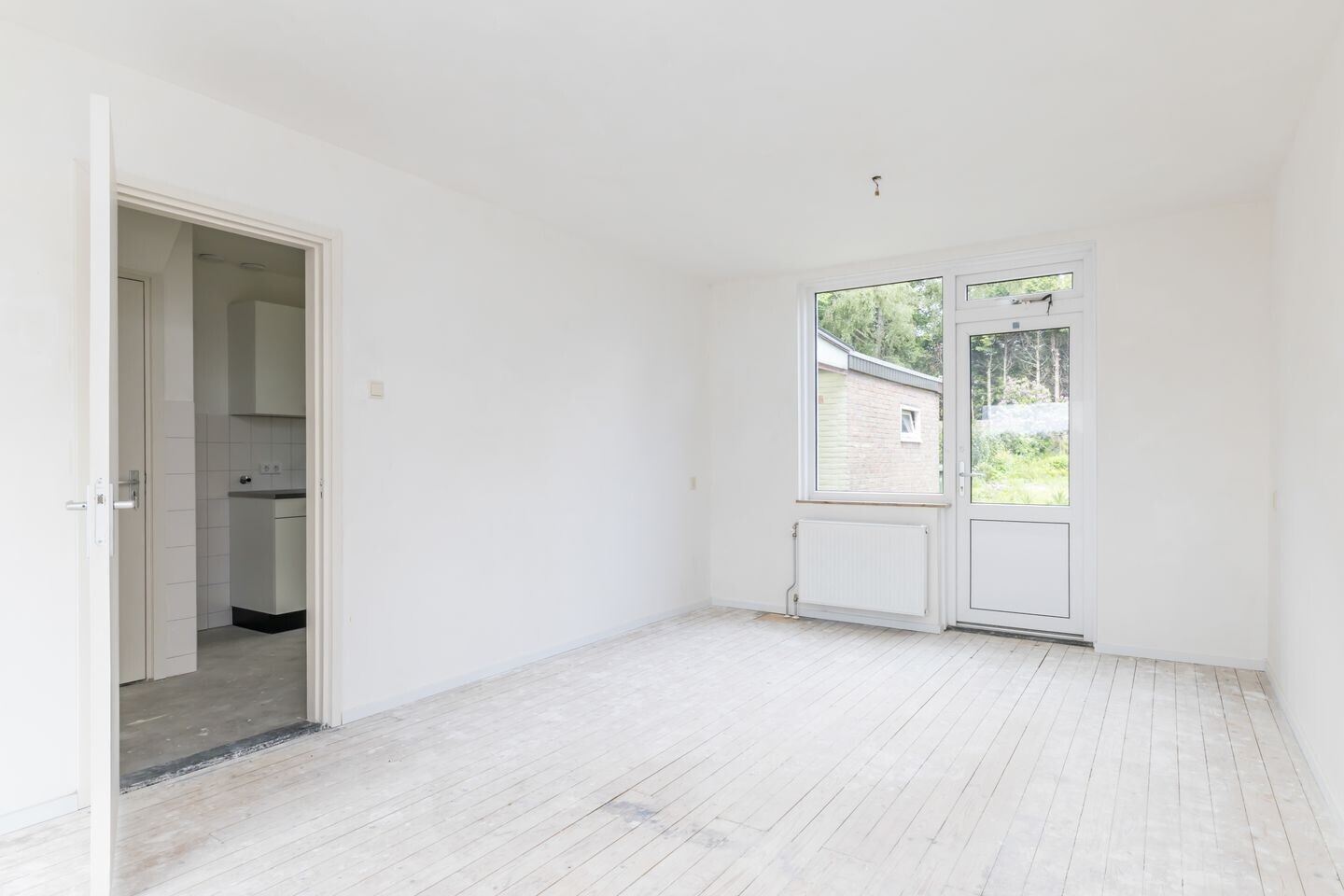 Tussenwoning te koop: Irenestraat 18, Hulsberg