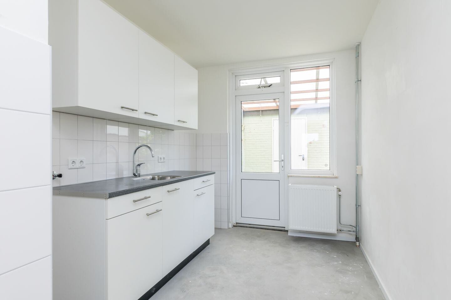 Tussenwoning te koop: Irenestraat 18, Hulsberg