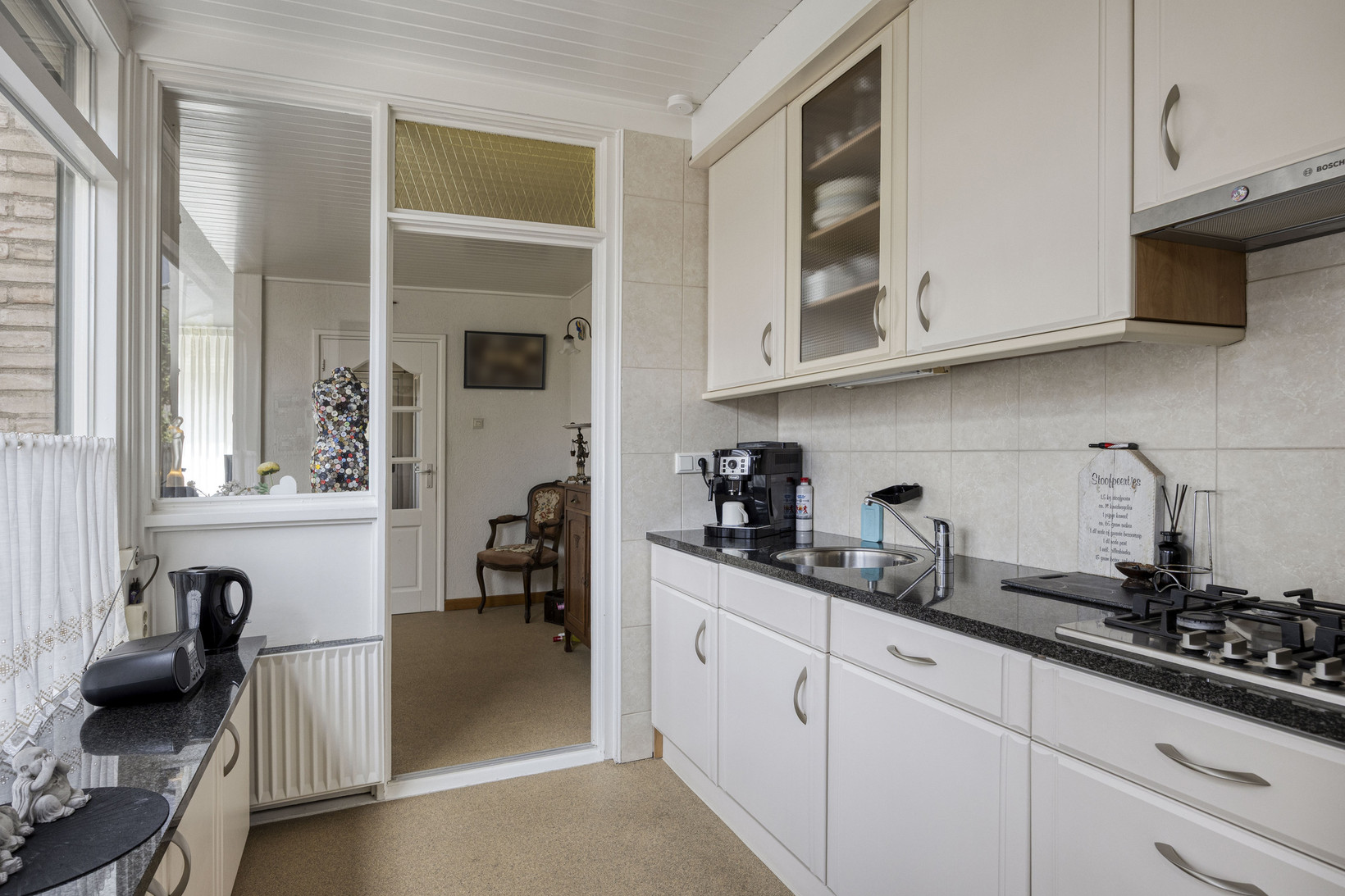 Tussenwoning te koop: Thomas van Heereveldstraat 26, Weurt