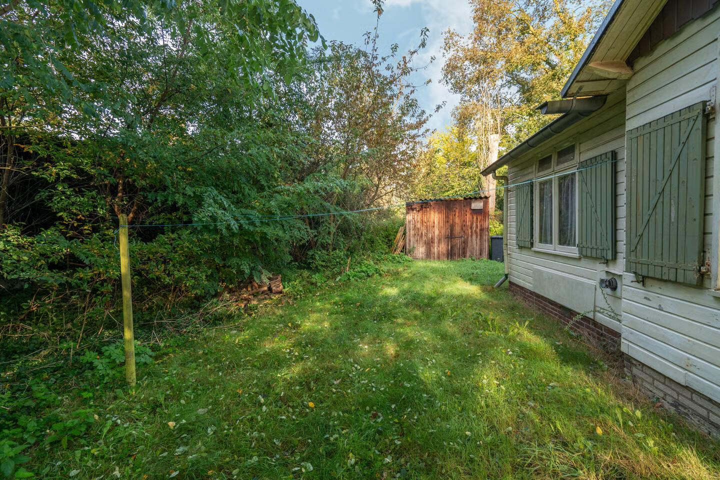 Vrijstaande woning te koop: Langstraat 125, Milsbeek