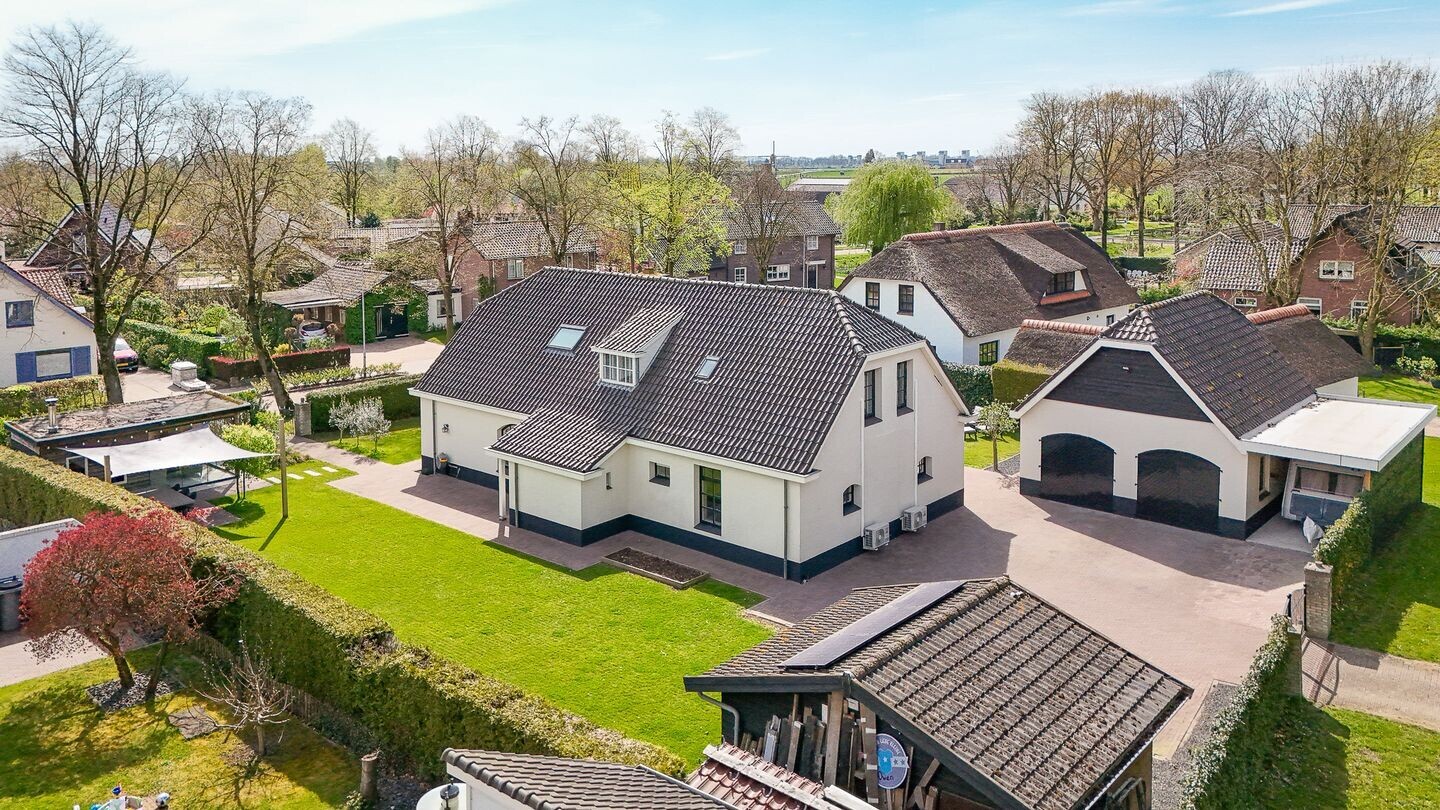 Vrijstaande woning te koop: Middendam 12, Alphen