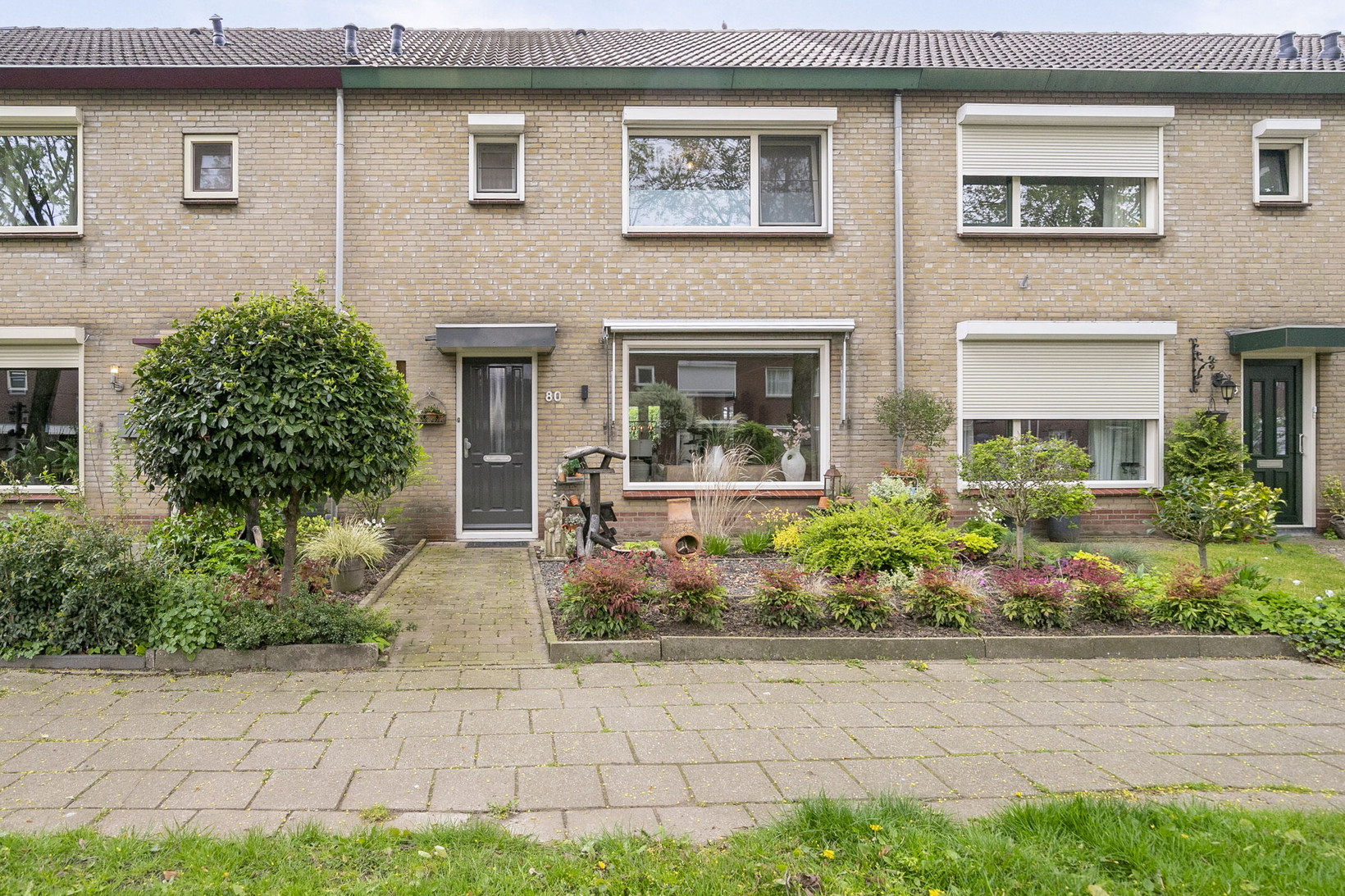 Tussenwoning te koop: Emmastraat 80, Angeren