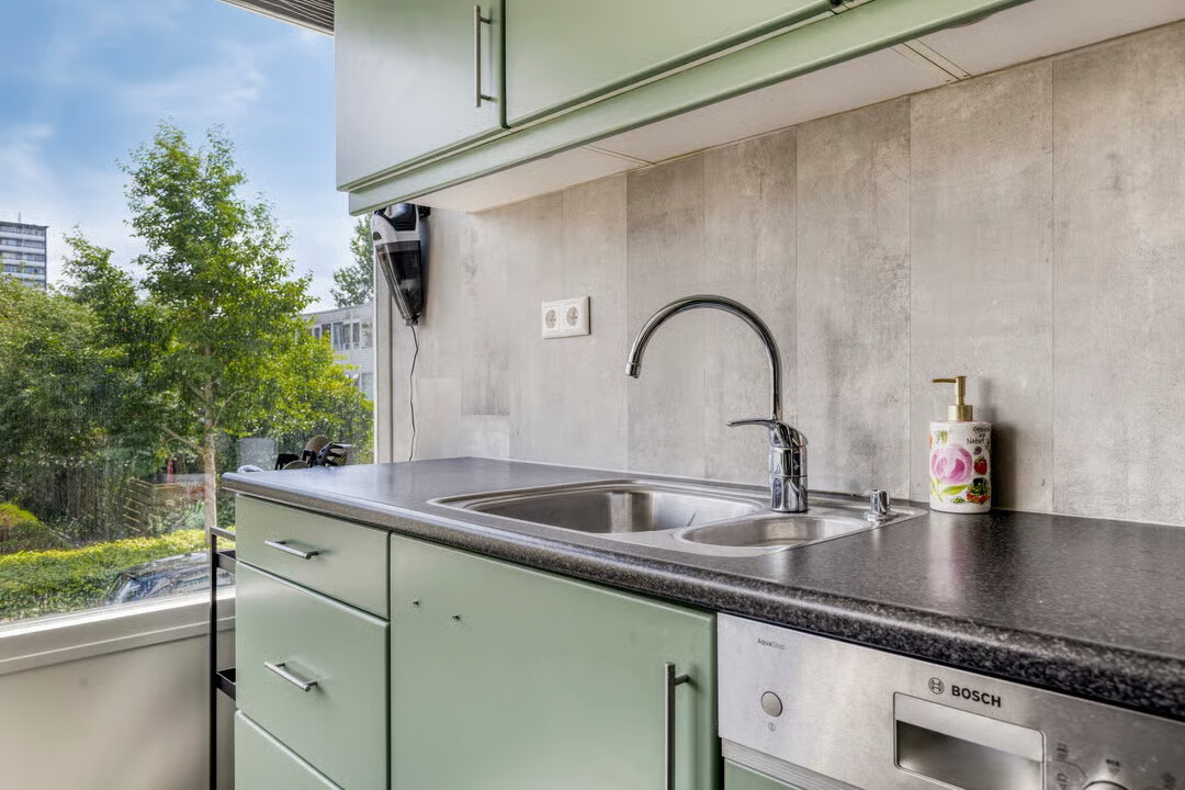 Tussenwoning te koop: Langenhorst 21, Ede