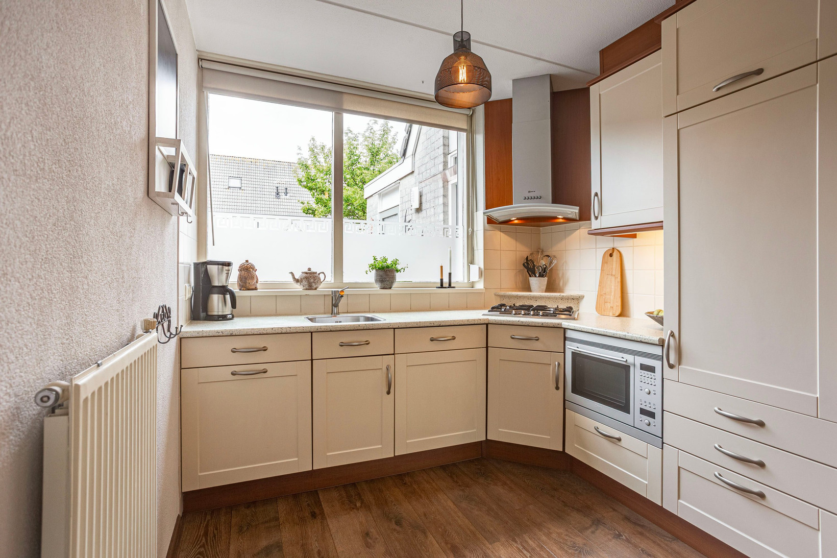 Tussenwoning te koop: Kennedydreef 17, Ede